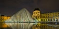 PARIS, FRANCE - July, 22, 2011: Louvre museum at night. Royalty Free Stock Photo